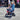 Man riding with a young girl on a BurroMax TT250 Electric Mini Bike equipped with training wheels.