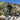 Man riding Hiboy P6 fat tire e-bike over rocky terrain in a forested area.