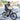 Man riding Hiboy P7 E-Bike on city streets, showcasing its sleek design and commuter efficiency.