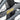 Close-up of Cheetah branding on the frame of a Plus Cafe' Racer Ebike.