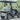 TrailMaster Taurus 50EV 4-seat electric golf cart with 60V motor, aluminum wheels, off-road tires, LED headlights, side mirrors.
