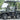 TrailMaster Taurus 50EV 4-seat electric golf cart with 60V motor, off-road tires, and DOT light package, parked outdoors.