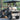 TrailMaster Taurus 50EV electric golf cart, 4-seat, featuring 60V motor, aluminum wheels, and DOT light package in outdoor setting.