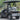 TrailMaster Taurus 50EV electric golf cart with aluminum wheels and off-road tires, 60V motor, side mirrors, and LED headlights.