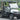 TrailMaster Taurus 50EV 4-seat electric golf cart with DOT light package, 60V motor, aluminum wheels, and off-road tires.