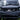 Front view of TrailMaster Taurus 80ED-U electric golf cart with LED headlights and TM logo.