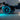Close-up of the B-ONE Balrog X electric skateboard's 120 mm Cloudwheels with blue lighting effect.