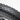 Close-up of a rugged, durable tire featuring aggressive tread design for enhanced grip and performance on various terrains.