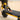 Kaabo 11" GT Pro Electric Scooter close-up of sturdy deck and suspension system on sandy terrain.