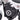 Close-up of BurroMax TT1000R Electric Mini Bike motor and frame with Burromax emblem