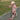 Girl aged 4-8 riding a Hiboy ES-1 electric scooter in a park, wearing a helmet and protective gear.