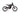 The 79BIKE Falcon Pro in red and black, featuring a 10,000W Peak Motor and a top speed of 56mph.