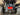 Rear view of TrailMaster Blazer i2K Electric Go Kart showcasing suspension, tires, and frame.