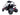 TrailMaster Blazer i2K Electric Go Kart with lithium battery, rear view showing rugged tires and safety harness against white background