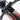 Cheetah Plus Cafe Racer Ebike handlebars with digital display and brown seat.