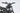 The GhostCat F3X 1500W Pro in black, boasting 35MPH and KKE Suspension.