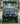 TrailMaster Taurus 50EV 4-seat electric golf cart with 60V motor and DOT light package parked on grass.