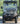 TrailMaster Taurus 50EV 4-seat electric golf cart with full DOT light package, featuring a 60V motor and off-road tires.