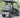 TrailMaster Taurus 50EV electric golf cart with 60V motor, 4 seats, DOT lights, off-road tires, and digital dashboard