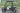 TrailMaster Taurus 50EV electric golf cart with 60V motor, 4-seat, DOT light package, aluminum wheels, and off-road tires.