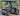 TrailMaster Taurus 50EV 4-seat electric golf cart with 60V motor, off-road tires, and DOT light package on outdoor path.