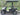 TrailMaster Taurus 50EV 4-seat electric golf cart with 60V motor, DOT light package, aluminum wheels, and off-road tires.