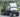 TrailMaster Taurus 50EV 4-seat electric golf cart with DOT light package, 60V motor, aluminum wheels, and off-road tires.
