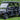 TrailMaster Taurus 80ED-GV 6-seat electric golf cart with extended roof, featuring two front-facing rows and convertible cargo area.
