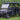 TrailMaster Taurus 80ED-U 4-Seat Electric Golf Cart with 72V Motor and Aluminum Wheels, parked on grass