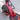 Close-up of the Kaabo Mantis 10 Lite electric scooter frame with red accents and a black deck design.