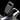 Close-up of the handle of the Begode X-Way Electric Unicycle with sleek design and display features.